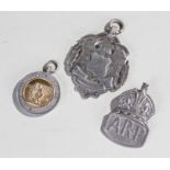Silver ARP badge, together with a Football medal and another large medal, (3)