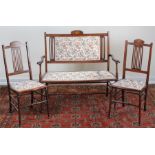 Edwardian three piece suite, to include a settee and two chairs