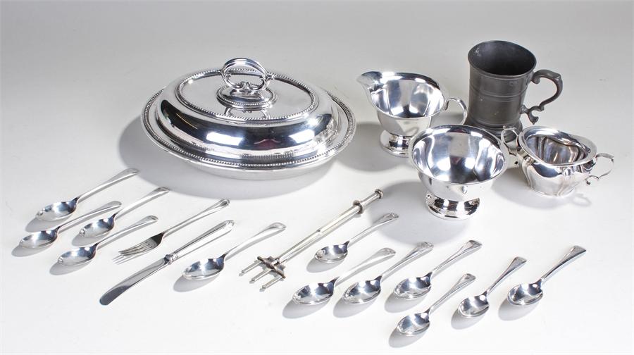 Mixed plated silver, to include an entree dish, jugs, flatware, (qty)