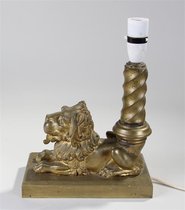 Early 20th gilt bronze table lamp, in the form of a lion, laying on a plinth base, 22cm long, 11.5cm - Image 2 of 2