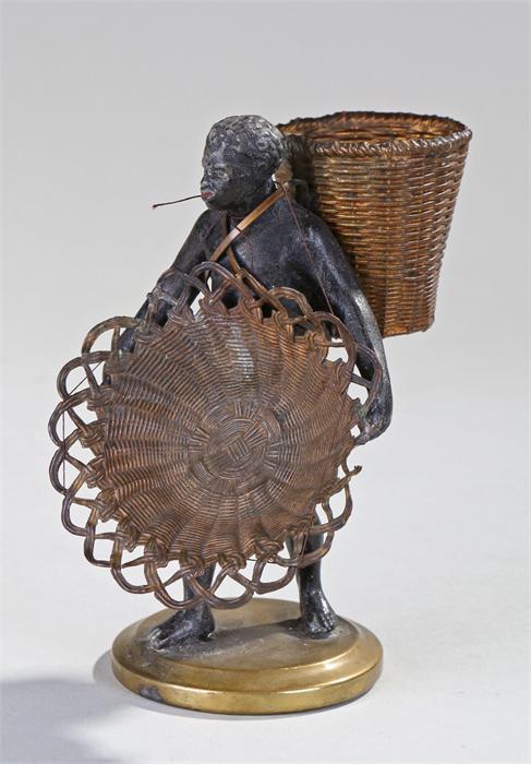 19th Century spelter figure of a Blackamore, carrying a basket to his back and a large basket to the - Image 2 of 2