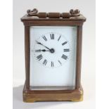 Early 20th Century brass cased carriage clock, with roman numeral dial