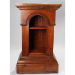 Victorian pine lectern, the rectangular top above arched panels, internal shelved area on a arched