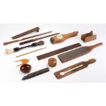 Collection of treen, to include a mousetrap, a baton, brush, juicer, rules, etc (qty)