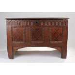 Mid 17th Century oak and inlaid coffer, the rectangular top with moulded edge above a thumb