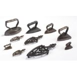 19th Century miniature irons and trivets, to include six irons, size range 3cm to 8.5cm, together