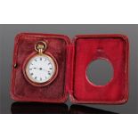 Waltham Watch Company gold plated watch, the open face case with Roman numerals, housed within a red