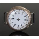 Silver open face watch, the white enamel dial with black Roman hours, 33mm diameter