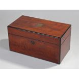 Victorian mahogany tea caddy. The rectangular top with brass shield inlaid with a Bramar lock, a