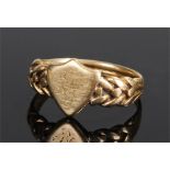 18 carat gold signet ring, the shield head with rope link shoulders, ring size N, 4.2 grams