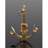 Yellow metal anchor pendant, with scroll anchor ends above a tapering shaft, 35mm high