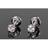 Tiffany pair of platinum and diamond ear studs, the platinum screw backs with diamond heads, the