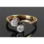 18 carat gold diamond ring with two diamonds in a cross over shank, diamonds approximately 0.30