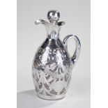 Edward VII silver and glass claret jug, London 1909, maker William Comyns. The glass jug with