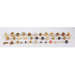 Impressive collection of thirty seven Japanese ojime beads, to include an ivory figure, ivory