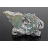Chinese jade vessel, a beast looking backwards attached to the vessel lip, 10cm long