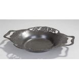 Liberty Tudric pewter dish, signed to the base "Tudric" 0287, with pierced foliate sides and heart
