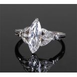 White metal and diamond set ring, the central marquise brilliant cut, flawless diamond at 1.18