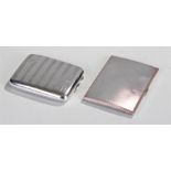 Two silver cigarette cases, the first Sheffield 1936, maker Walker & Hall. The engine turned case