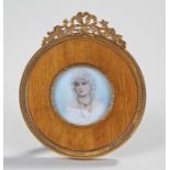 Early 20th Century miniature of a lady with white hair, oil on ivory, housed within an oak and