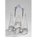 WMF Cruet set, the silver plated high handle above three lidded glass vessels and two dishes to