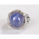 Fine Ceylon star sapphire and diamond ring, the white metal shank with a cabochon cut Ceylon, non