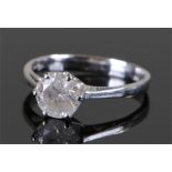 9 carat white gold diamond solitaire ring. The approximately 1 carat central diamond within a six