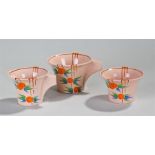 Clarice Cliff Bizarre trio set, decorated in the Damask Rose, to include a cup, milk jug and sugar