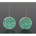 Pair of Chinese jade earrings, the yellow metal chain and mount with a green jade foliate and bird