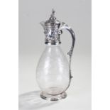 Victorian claret jug London, 1890, maker Charles Edwards. Cut glass body with silver lid, handle and