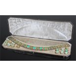 Fine silver gilt jade and garnet set cased belt, with seventeen panels of various sized jade and