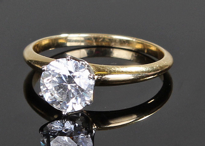 Tiffany 18 carat gold diamond solitaire ring, the diamond at 1.30 carats held with six platinum