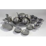 Chinese Kut Hing Swatow pewter tea service. To include a circular tray and a tea pot, milk jug,