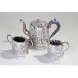 Delhi Durbar 1911 interest, an Indian white metal three piece tea service, to include the teapot,