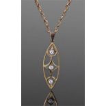 22 carat gold diamond set pendant, the elliptical pendant set with three diamonds. The pendant