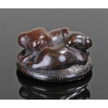 18th/19th Century Japanese netsuke, carved as two dogs, 42mm wide