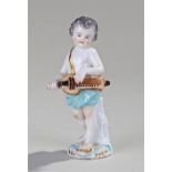 19th Century Samson porcelain figure, a cherub playing a hurdy-gurdy, 11cm high