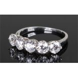 Platinum five diamond set ring, with a row of five diamonds each approximately 0.4 carats, ring size