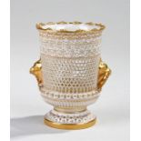 Royal Worcester vase, by George Owen, the pierced lattice work with gilt bird head handles,