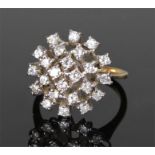 Yellow metal and diamond set ring, the stepped diamond head with twenty-four diamonds, ring size N