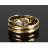 18 carat gold snake ring. The banded snake ring with a diamond set to the head, ring size P