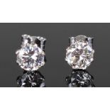 Pair of white metal diamond ear studs, at approximatley 1.68 carats in total