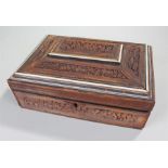 19th Century Indian carved sandalwood sarcophagus shaped work box, having allover foliate and animal