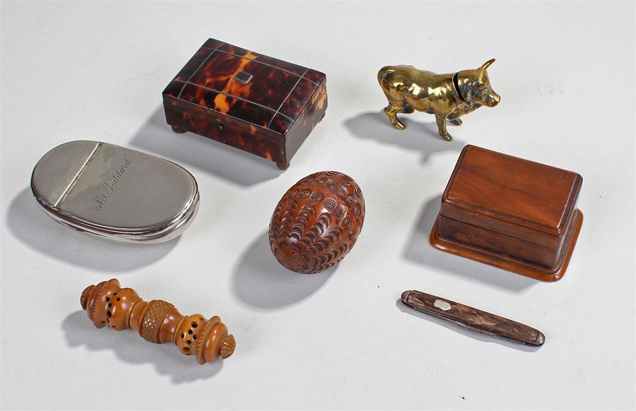 Victorian tortoiseshell box with an arched top inlaid with bands, three compartments raised on bun