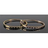 A pair of 9 carat gold diamond set bracelets, each set with ten diamonds making a total of