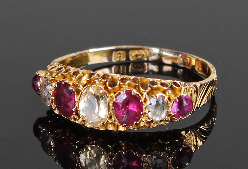 Victorian 15 carat gold garnet and paste set ring with a row of garnets and paste stones, ring