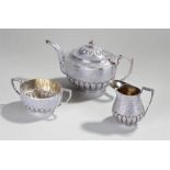 Delhi Durbar 1911 interest, an Indian white metal three piece tea service, with a teapot, milk jug