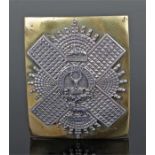 Gordon Highlanders sash badge, the silver badge mounted on brass, 7.5cm wide