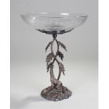 Edwardian silver plated table centre piece, the glass top above a giraffe standing beneath a palm