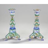 Pair of Mosanic French faience candlesticks, painted in blues, greens and orange, birds painted to